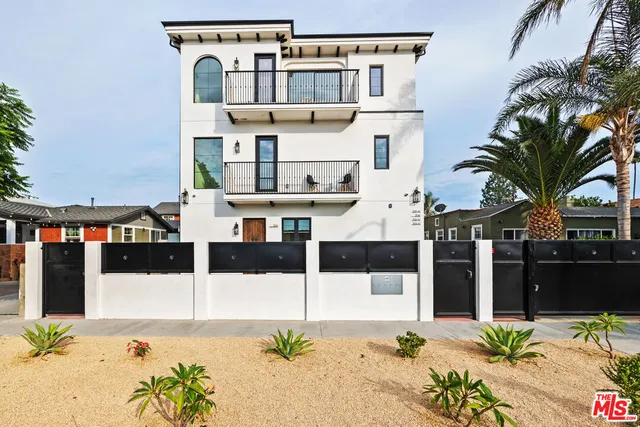 a front view of a building with street