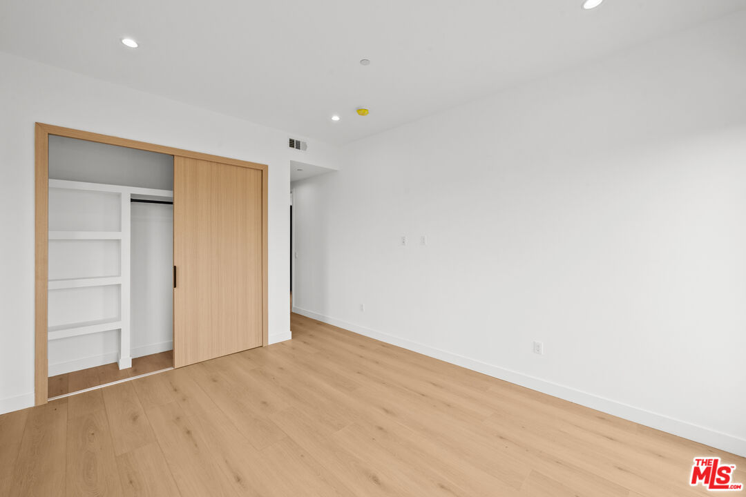 2324 South Dunsmuir Avenue, Unit 1/2 Los Angeles, CA 90016 - Photo 15 of 27 a view of an empty room