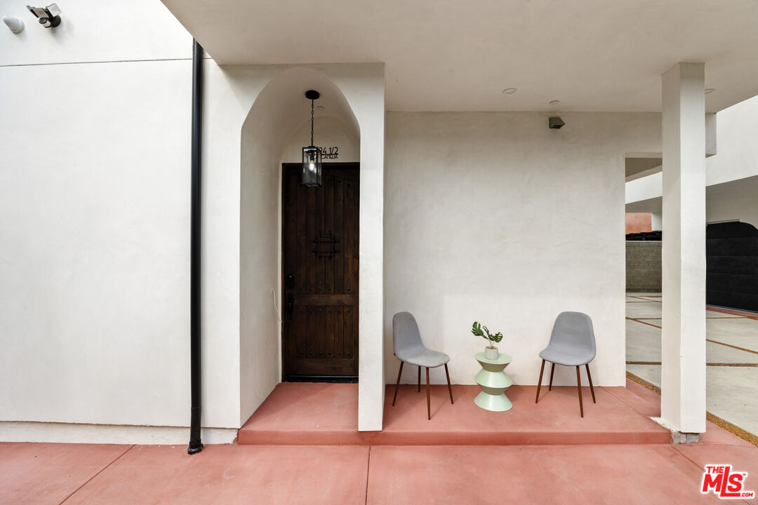 2324 South Dunsmuir Avenue, Unit 1/2 Los Angeles, CA 90016 - Photo 23 of 27 a living room with furniture