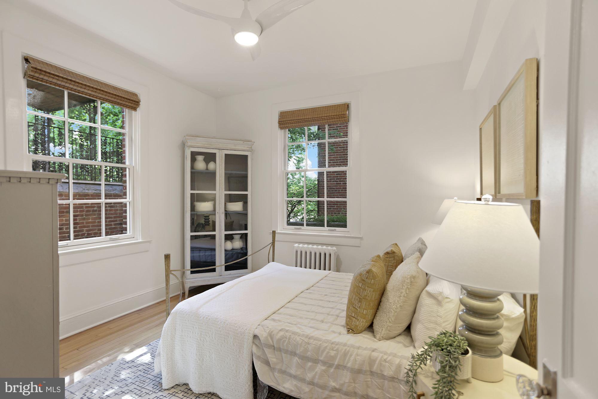 1705 Lanier Place Northwest, Unit 304 Washington, DC 20009 - Photo 16 of 35 Corner Bedroom with Large Windows