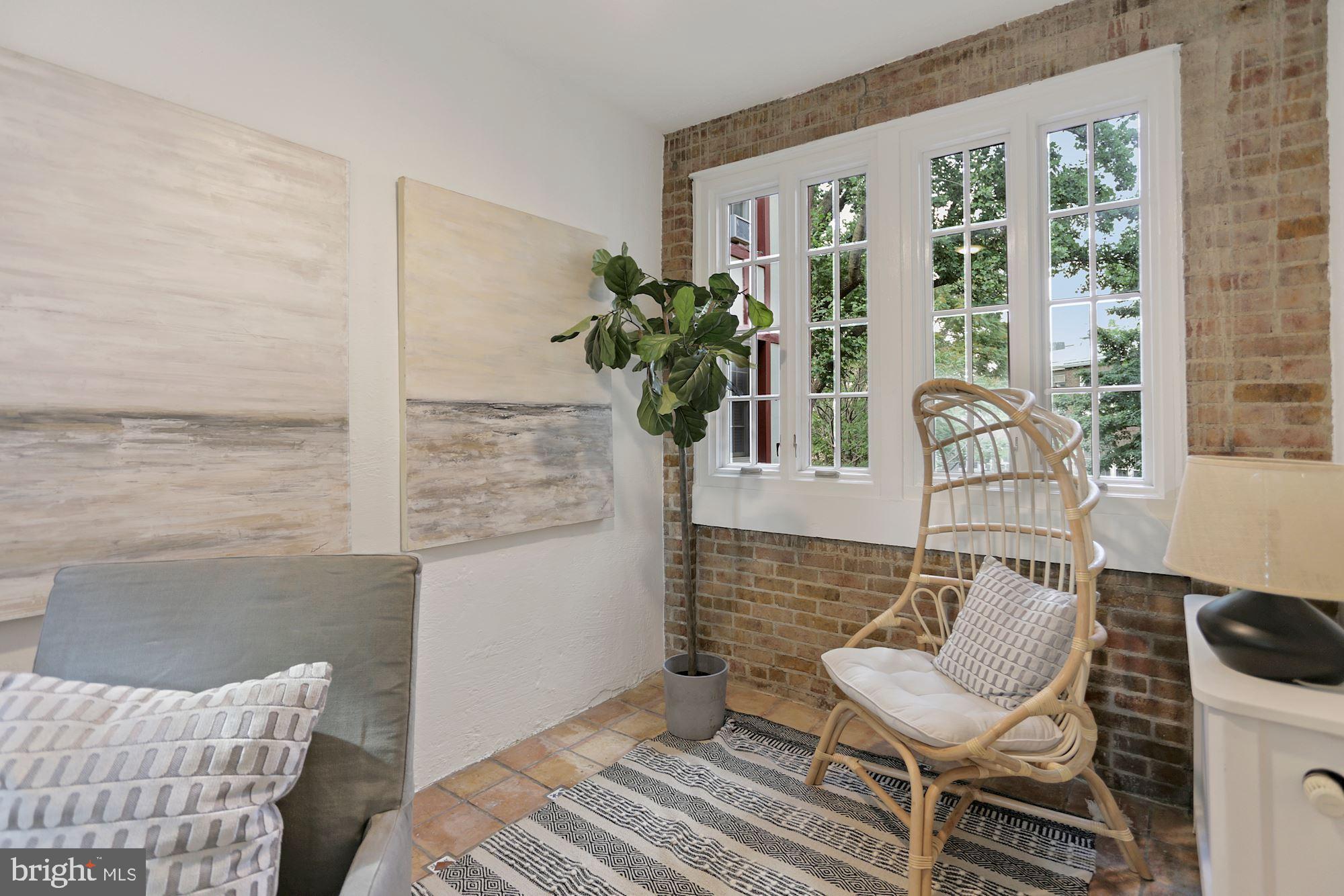 1705 Lanier Place Northwest, Unit 304 Washington, DC 20009 - Photo 24 of 35 Charming Exposed Brick with Treetop Views