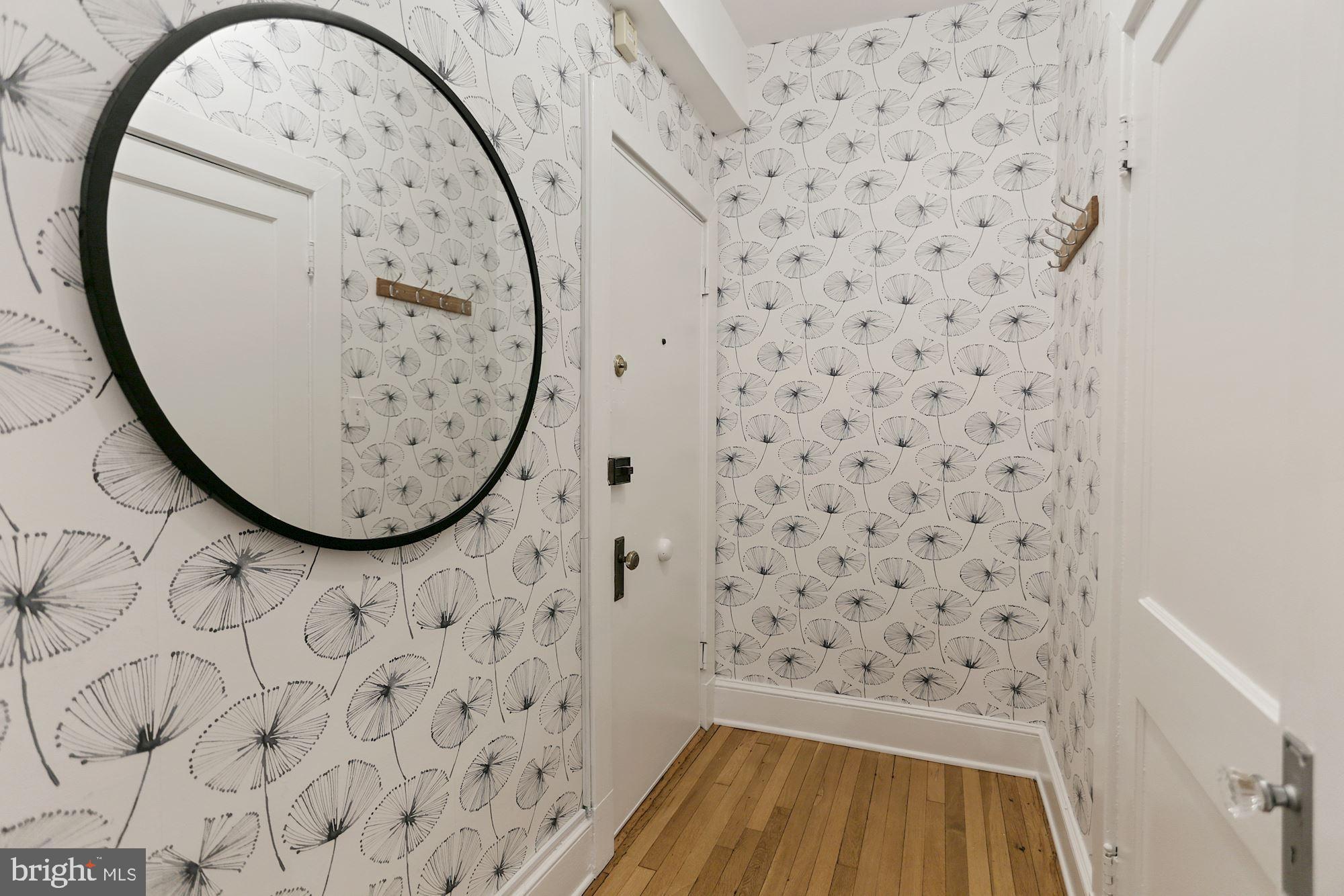 1705 Lanier Place Northwest, Unit 304 Washington, DC 20009 - Photo 3 of 35 Inviting Entry Foyer with Large Entry Closet
