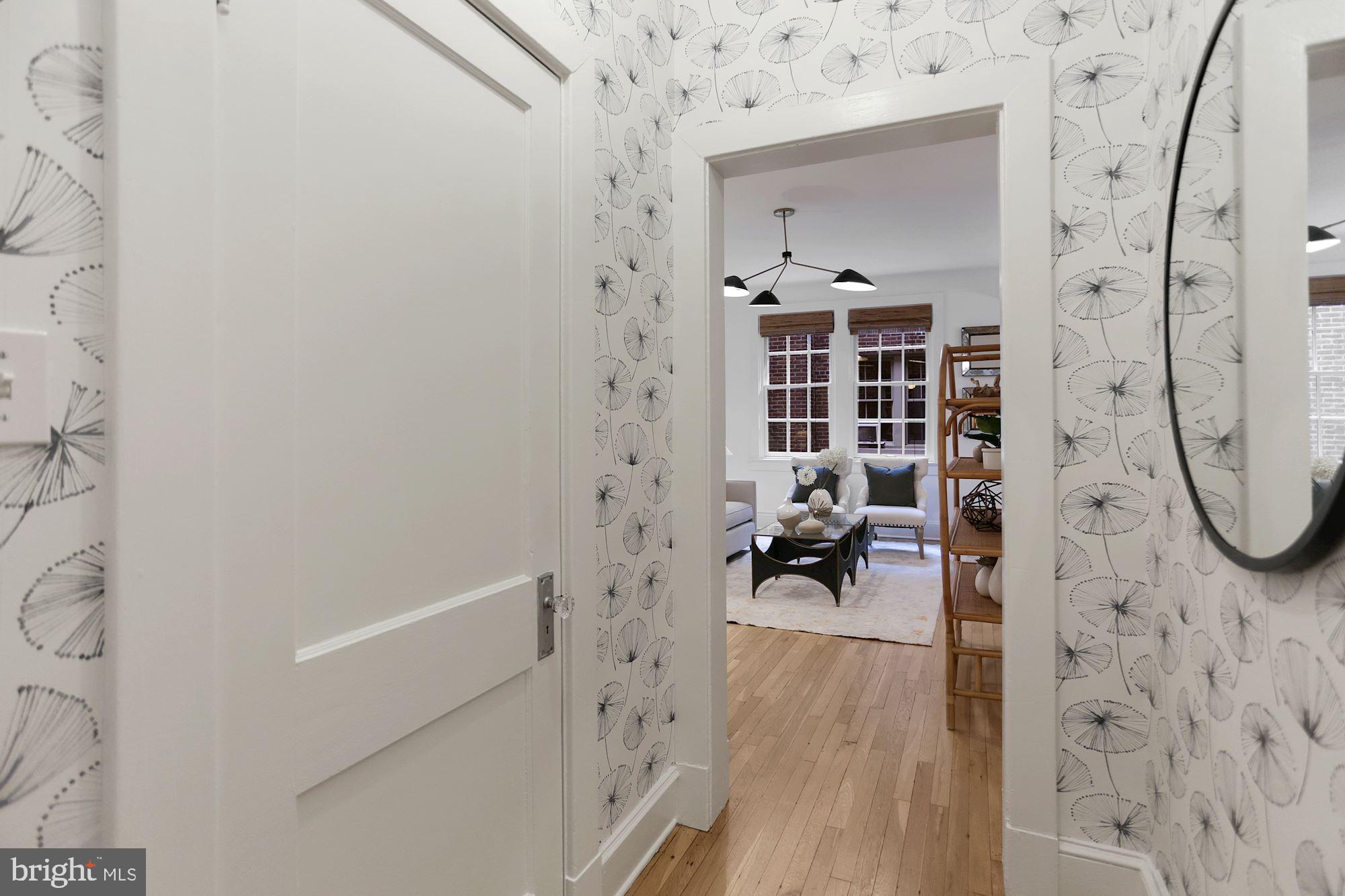 1705 Lanier Place Northwest, Unit 304 Washington, DC 20009 - Photo 4 of 35 Inviting Entry Foyer with Large Entry Closet