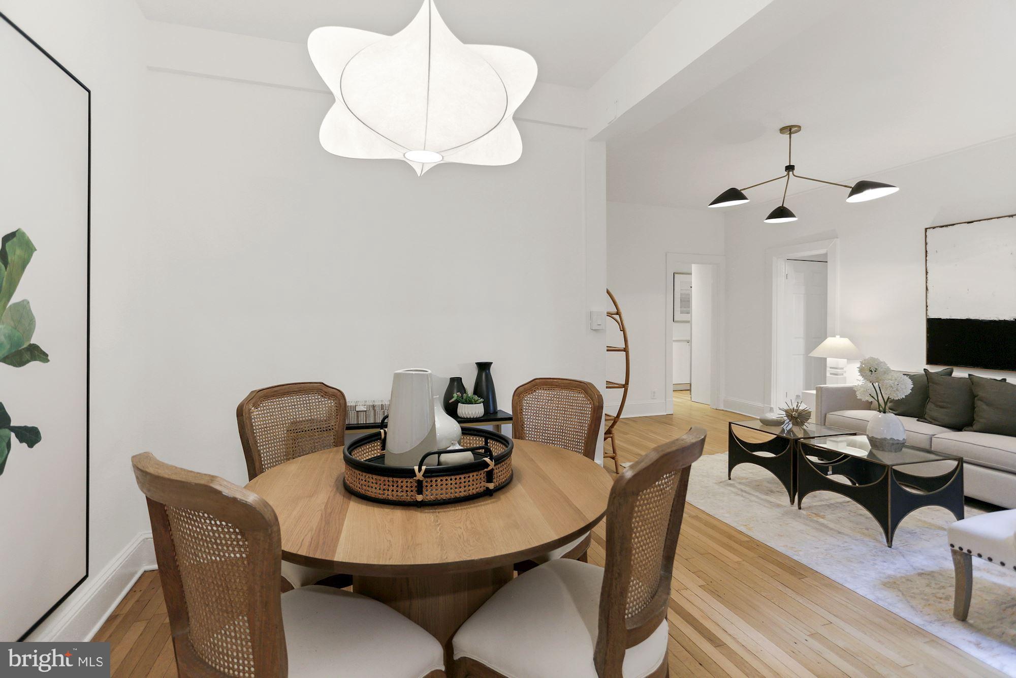 1705 Lanier Place Northwest, Unit 304 Washington, DC 20009 - Photo 9 of 35 Dining Area w Modern Chandelier
