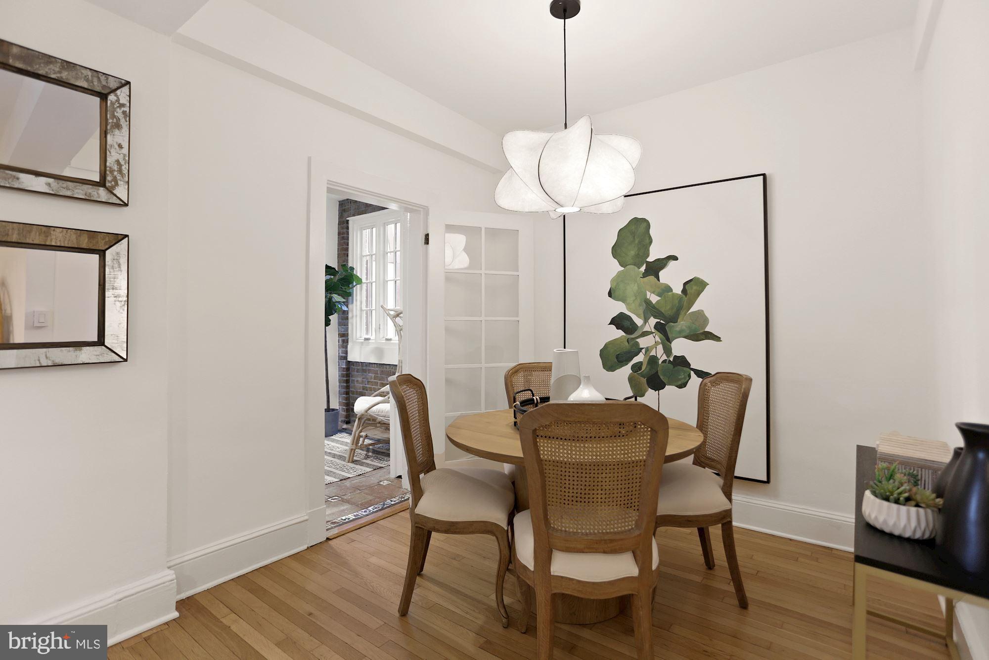 1705 Lanier Place Northwest, Unit 304 Washington, DC 20009 - Photo 10 of 35 Dining Area w Adjacent Sunroom/Den/Office