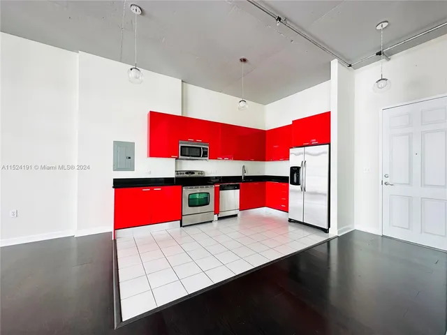 a bathroom with a toilet sink and a mirror
