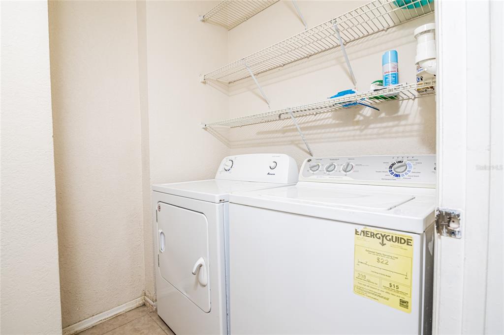 3391 South Kirkman Road, Unit 1216 Orlando, FL 32811 - Photo 26 of 33 a utility room with dryer and washer