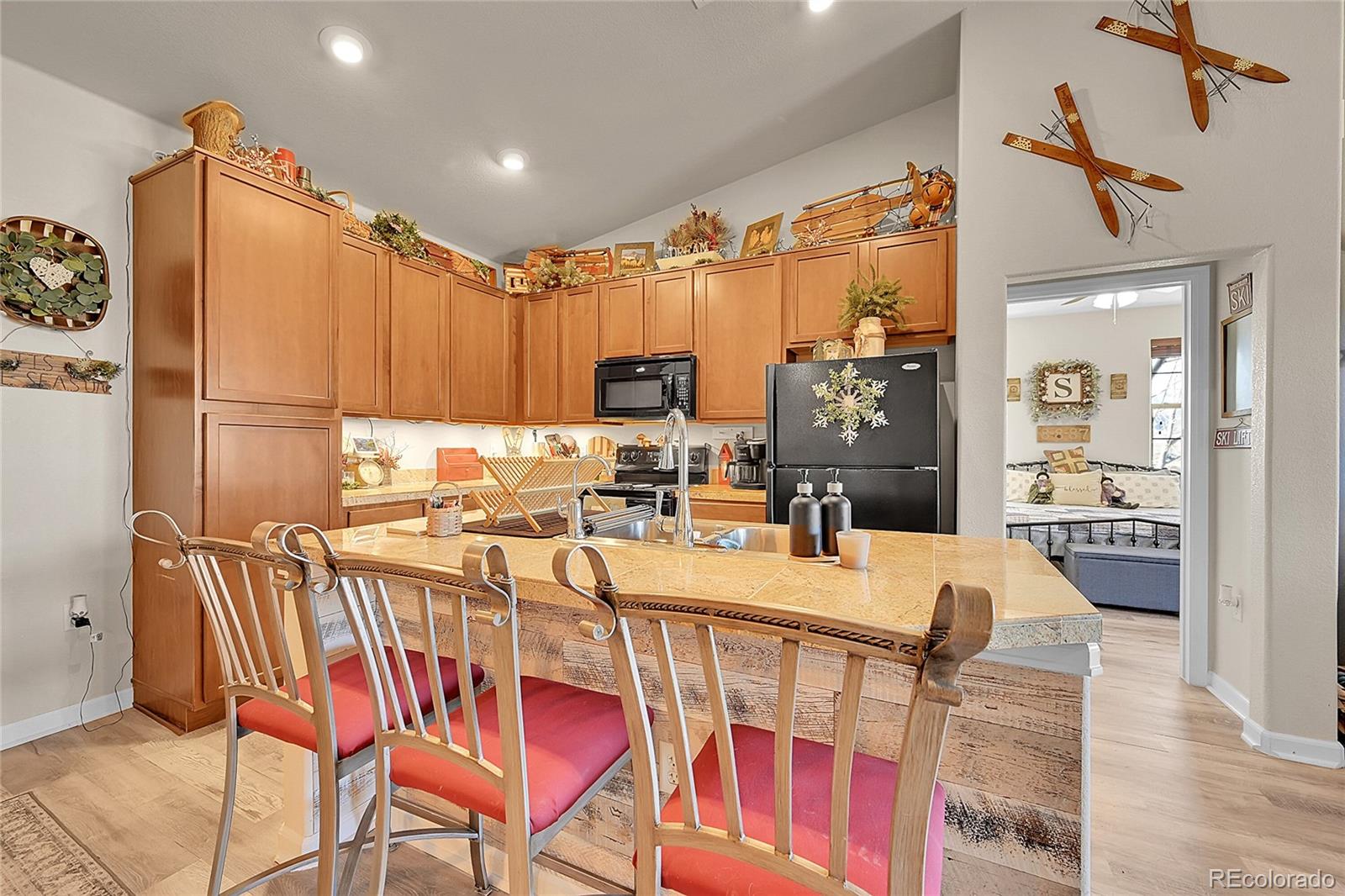 150 Village Road, Unit A302 Granby, CO 80446 - Photo 15 of 50 a view of a dining room with furniture window and wooden floor