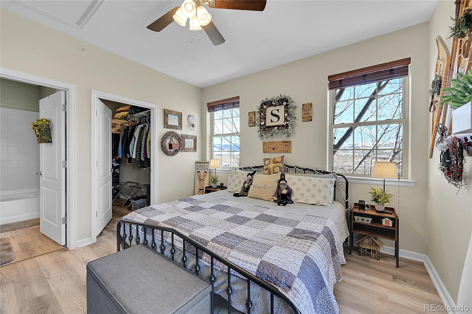 150 Village Road, Unit A302 Granby, CO 80446 - Photo 23 of 50 a bedroom that has a bed and a table in it