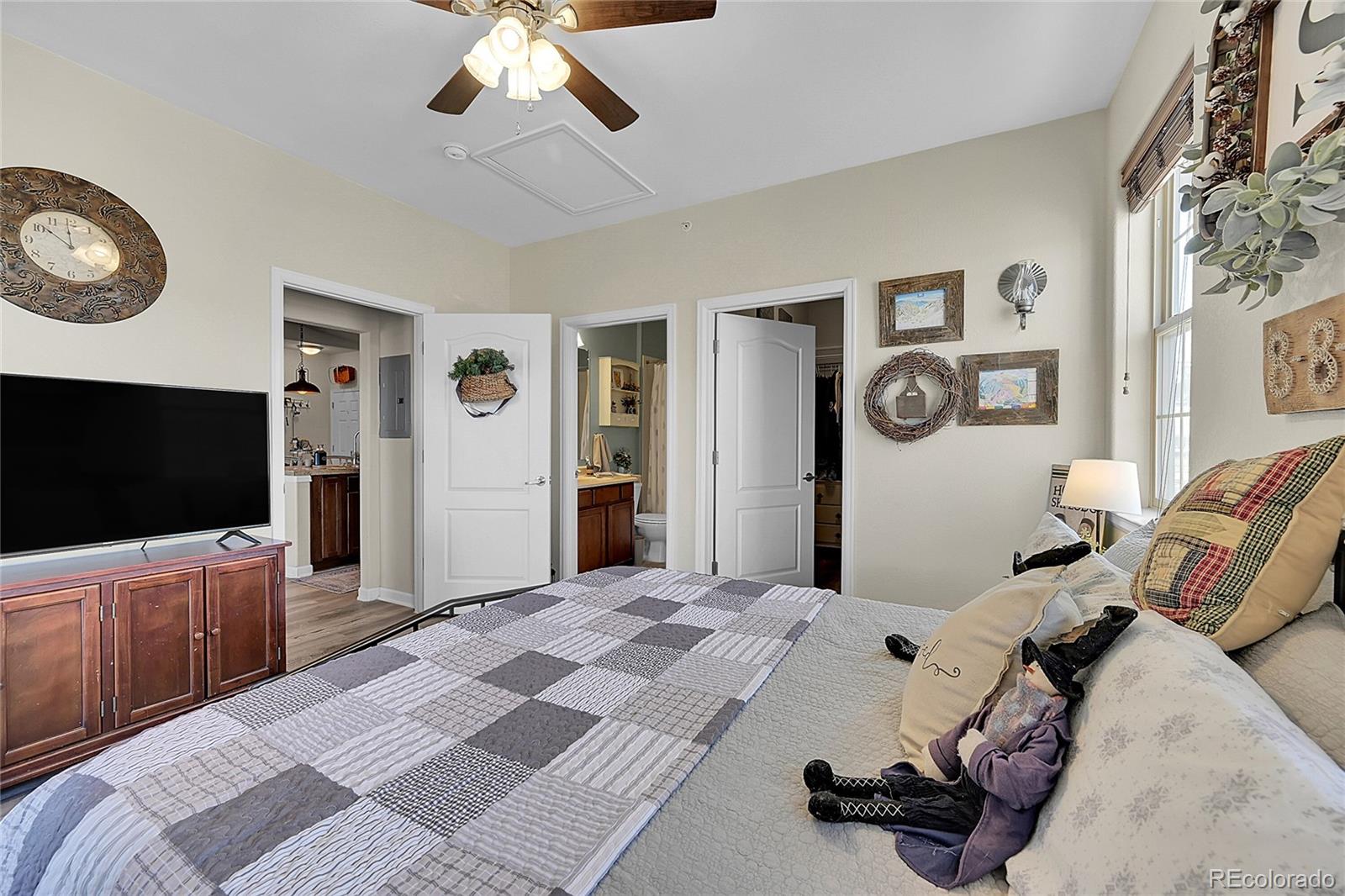 150 Village Road, Unit A302 Granby, CO 80446 - Photo 24 of 50 a bedroom that has a bed and a flat screen tv