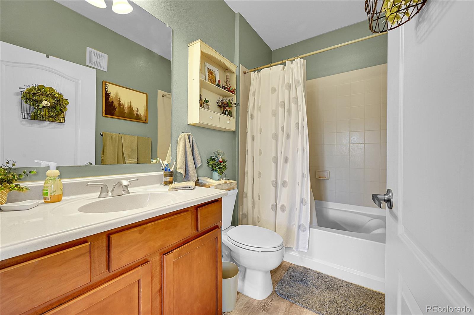 150 Village Road, Unit A302 Granby, CO 80446 - Photo 25 of 50 a bathroom with a sink and a mirror