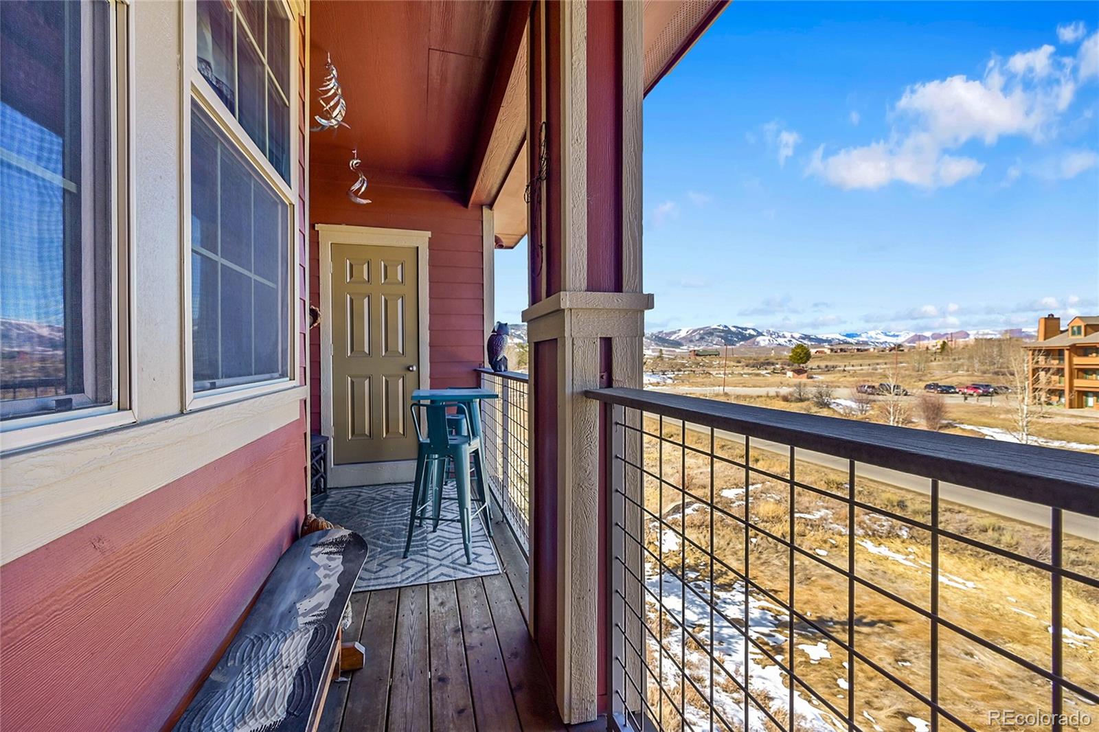 150 Village Road, Unit A302 Granby, CO 80446 - Photo 27 of 50 a view of a balcony with furniture