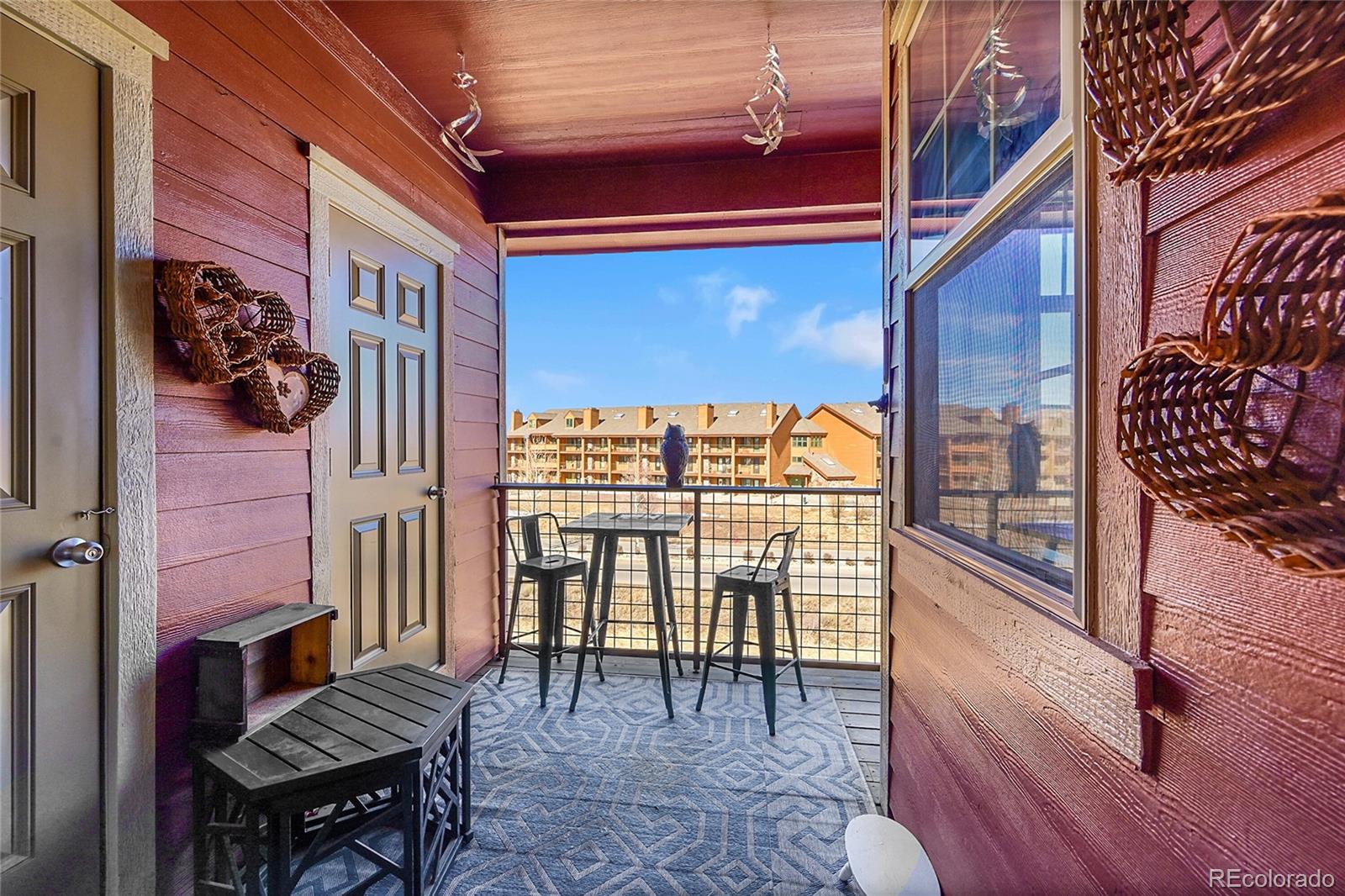 150 Village Road, Unit A302 Granby, CO 80446 - Photo 30 of 50 a view of front door of house with outdoor seating