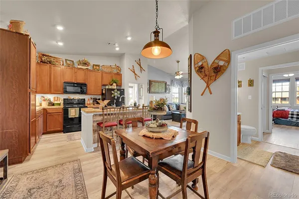 a view of a dining room kitchen and a window