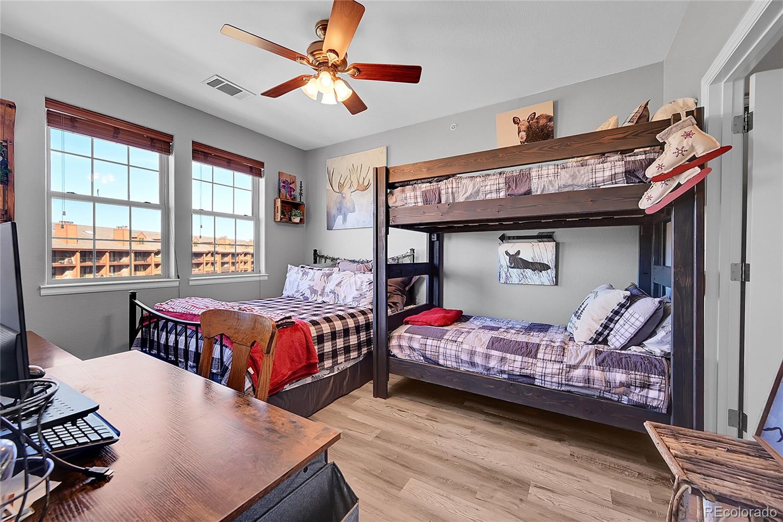 150 Village Road, Unit A302 Granby, CO 80446 - Photo 31 of 50 a bed room with a bed and a window