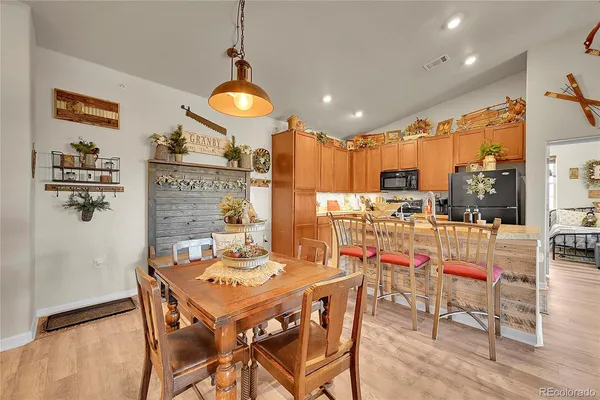 a view of a dining room with furniture