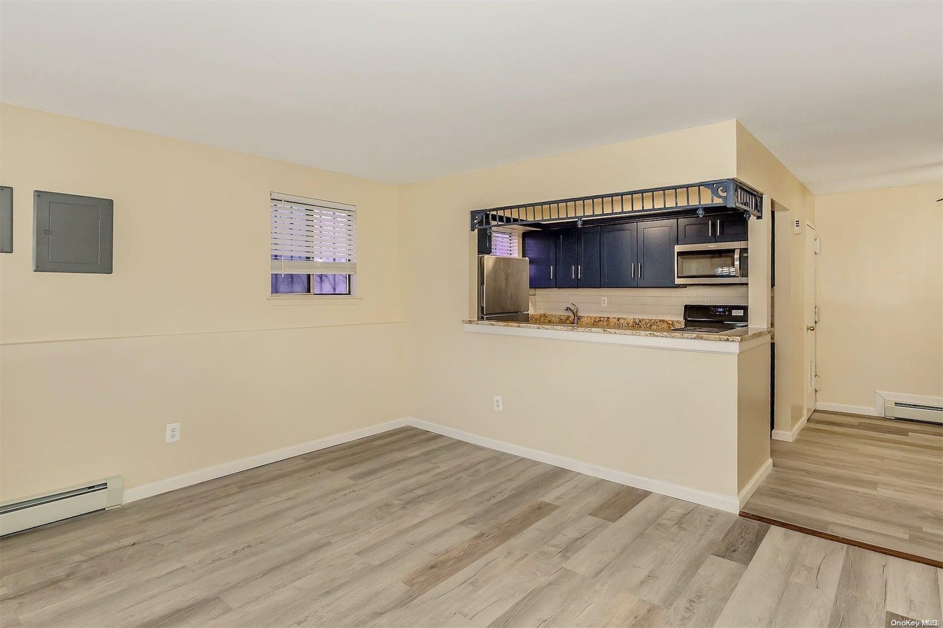 165-28 144th Drive Queens, NY 11434 - Photo 10 of 25 a view of kitchen and utility room