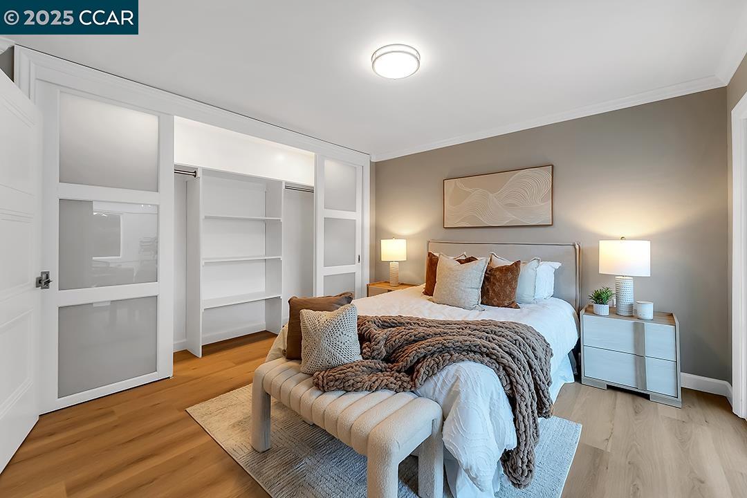 1180 Running Springs Road, Unit 4 Walnut Creek, CA 94595 - Photo 15 of 24 a bedroom with a bed and a window