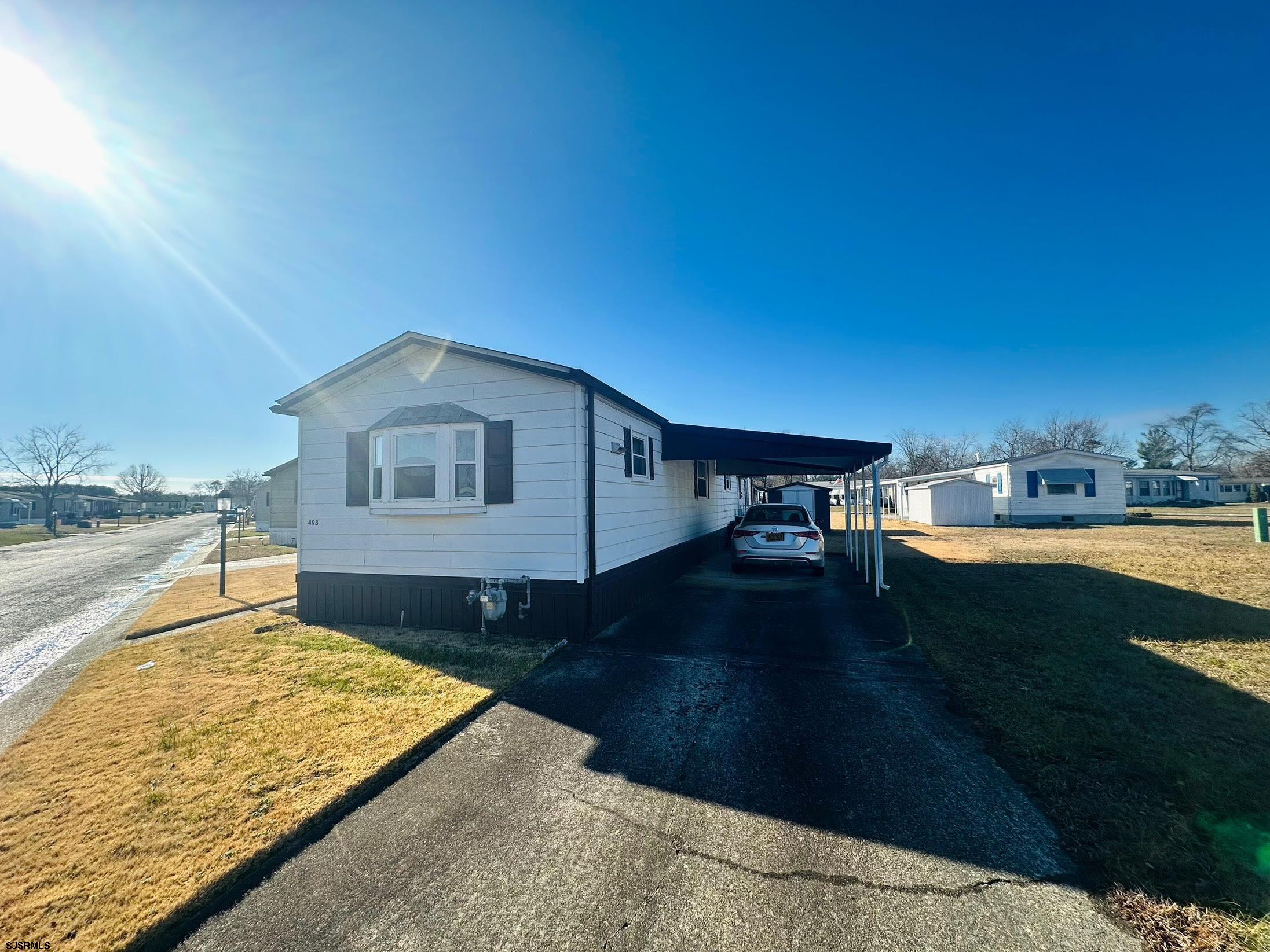 498 Pilgrim Way South Buena, NJ 08310 - Photo 3 of 28 a view of swimming pool with a yard