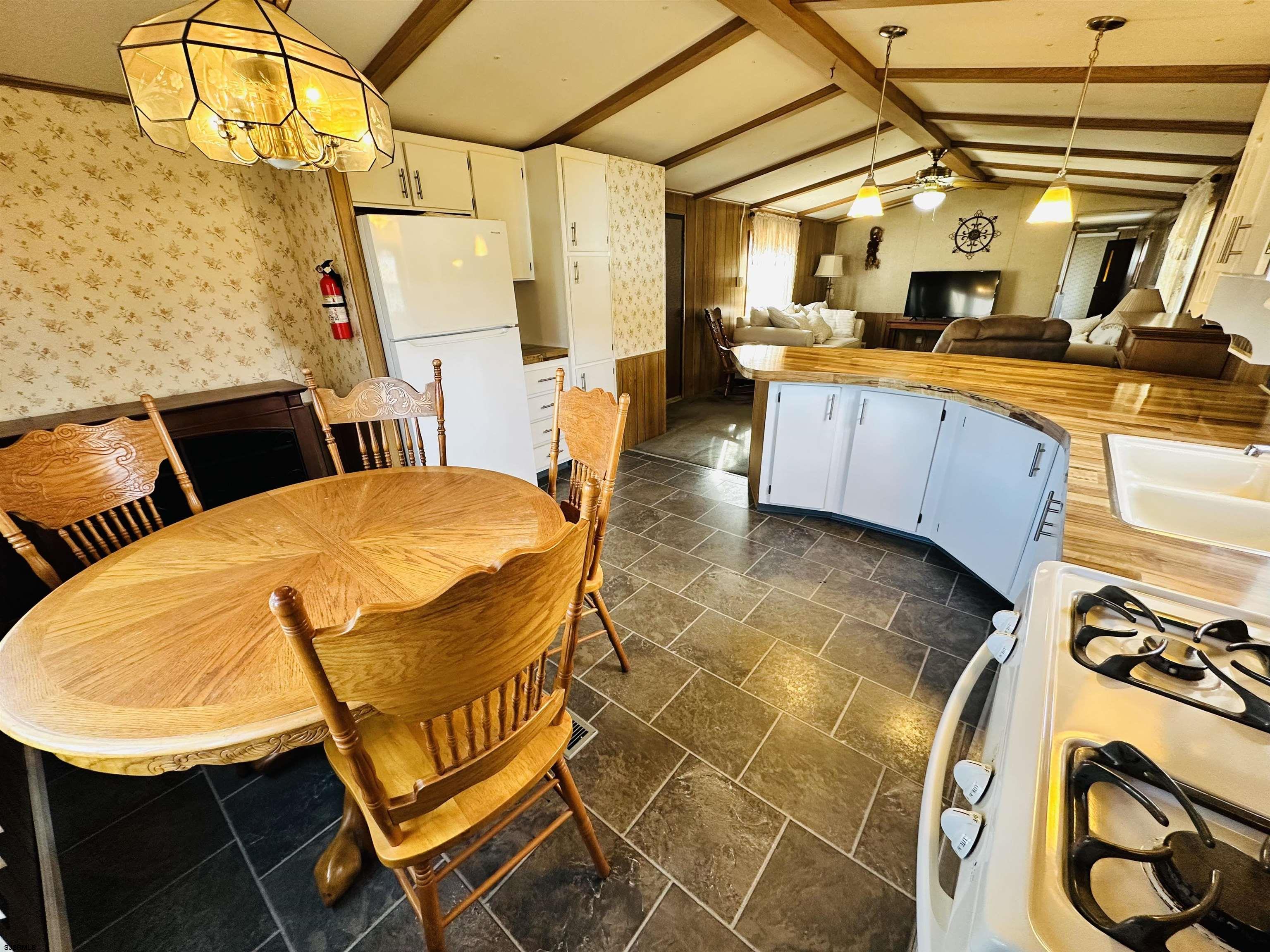 498 Pilgrim Way South Buena, NJ 08310 - Photo 7 of 28 a view of a swimming pool with a patio