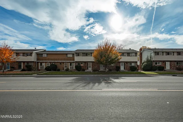 a view of a building with a street