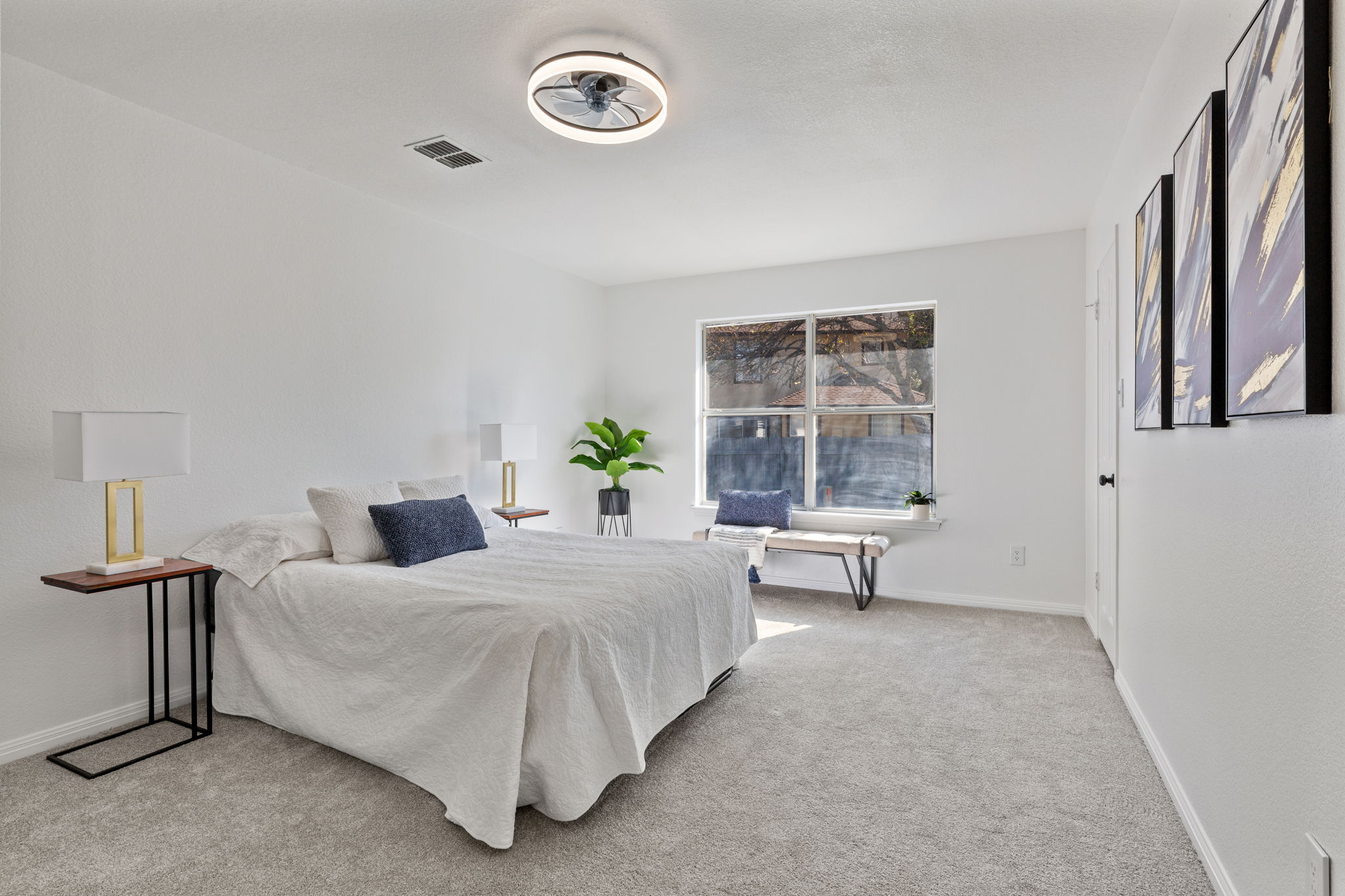 2127 Redwing Way Round Rock, TX 78664 - Photo 12 of 33 a bedroom with a bed and a window