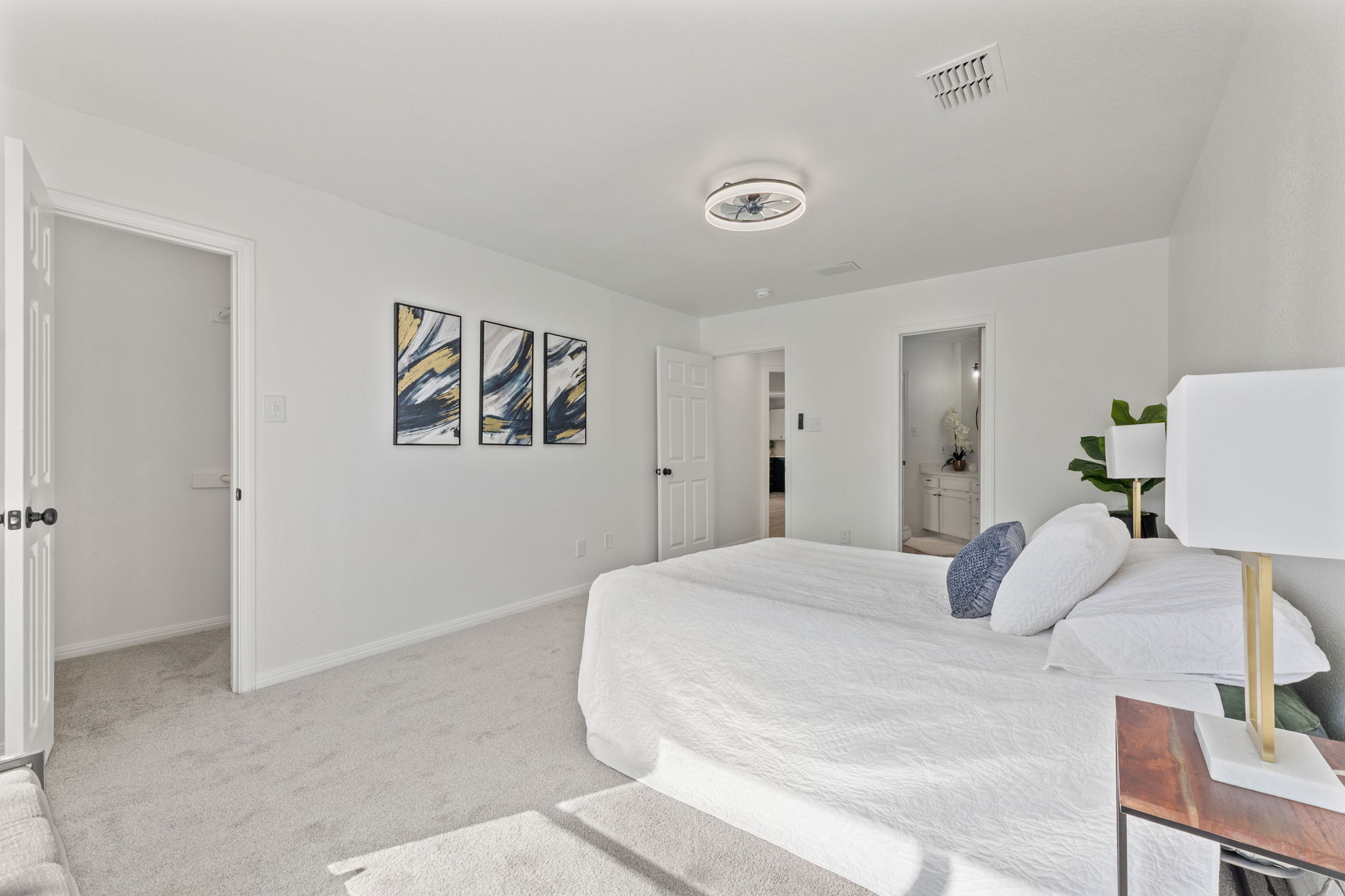 2127 Redwing Way Round Rock, TX 78664 - Photo 14 of 33 a bedroom with a bed and a couch