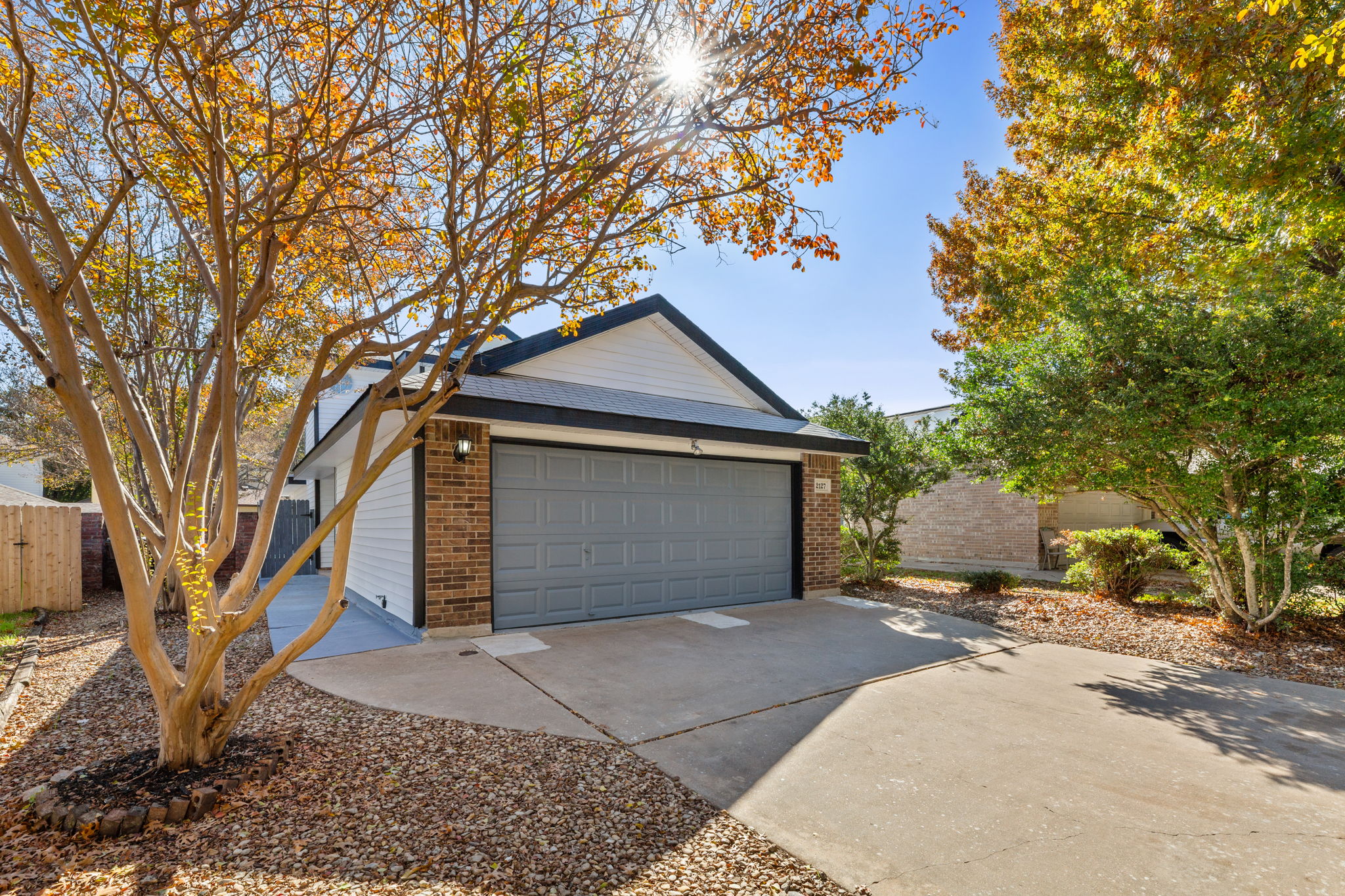 2127 Redwing Way Round Rock, TX 78664 - Photo 30 of 33 a front view of a house with a yard and garage