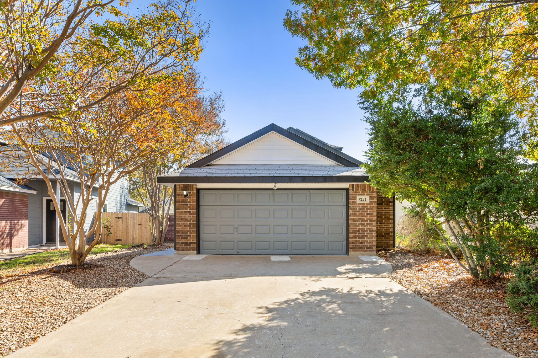 2127 Redwing Way Round Rock, TX 78664 - Photo 33 of 33 a front view of a house with a yard and garage