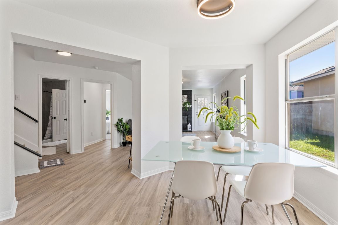 2127 Redwing Way Round Rock, TX 78664 - Photo 7 of 33 Dining room with baseboards and light colored finished floors