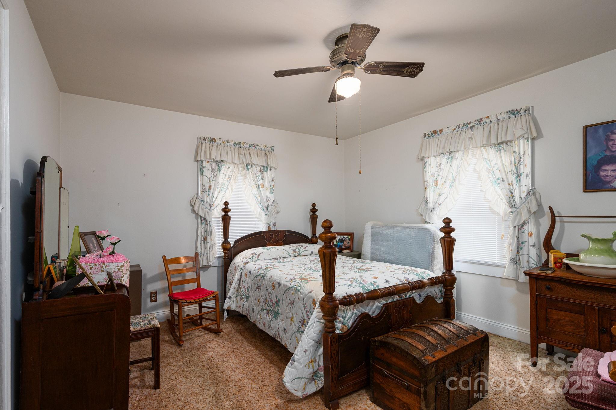 1544 Kings Road Shelby, NC 28150 - Photo 17 of 25 a bed room with a bed and a television