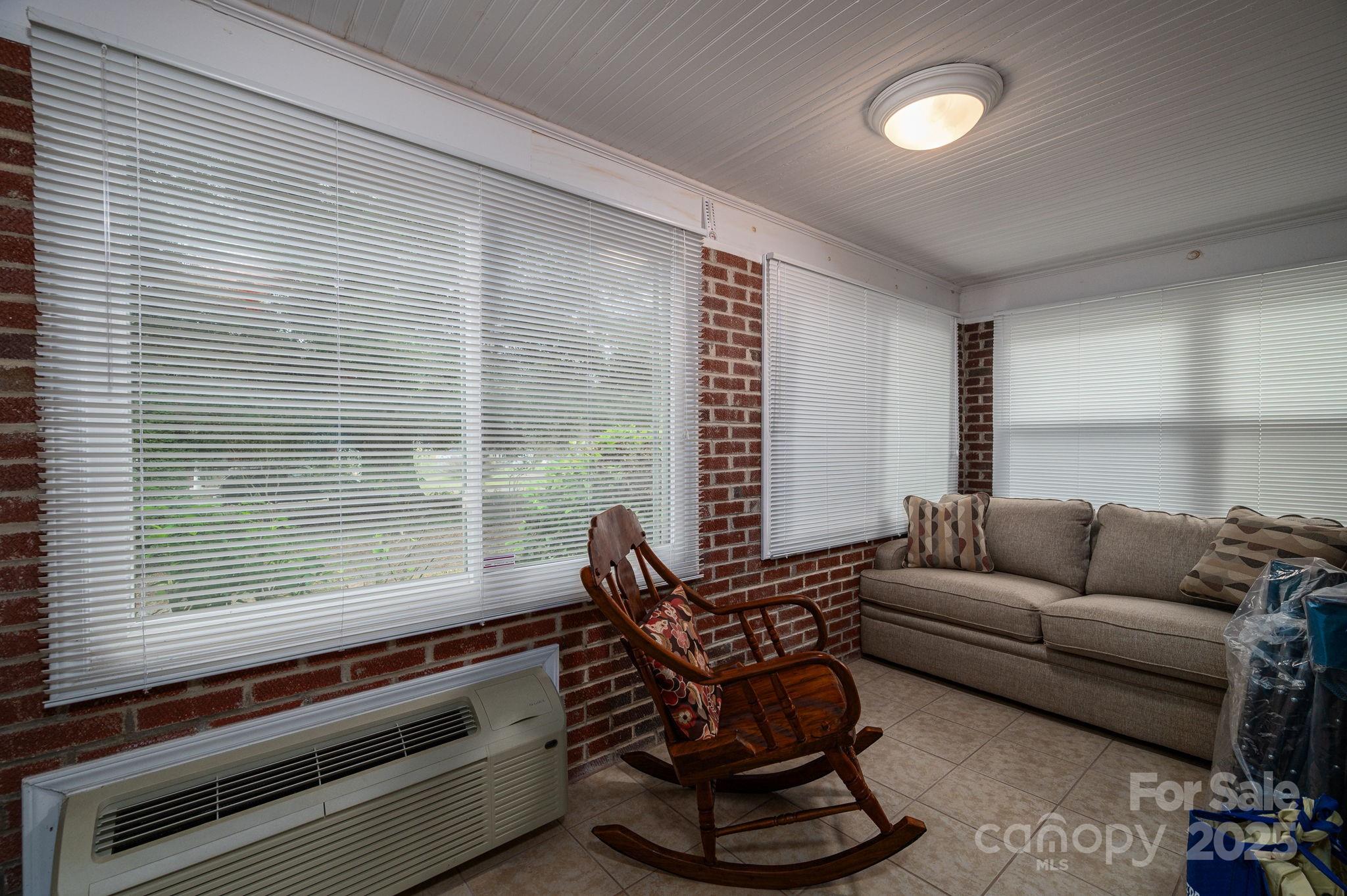 1544 Kings Road Shelby, NC 28150 - Photo 18 of 25 a living room with furniture and a large window