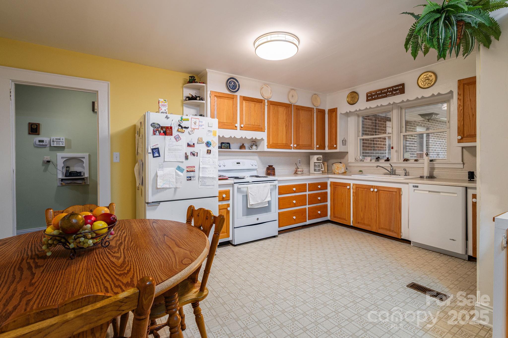 1544 Kings Road Shelby, NC 28150 - Photo 8 of 25 a kitchen that has a lot of cabinets a sink and appliances in it