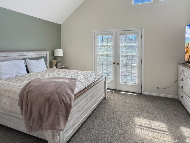 1716 Sagewood Road Price, UT 84501 - Photo 25 of 73 Bedroom with french doors, dark carpet, access to exterior, and vaulted ceiling