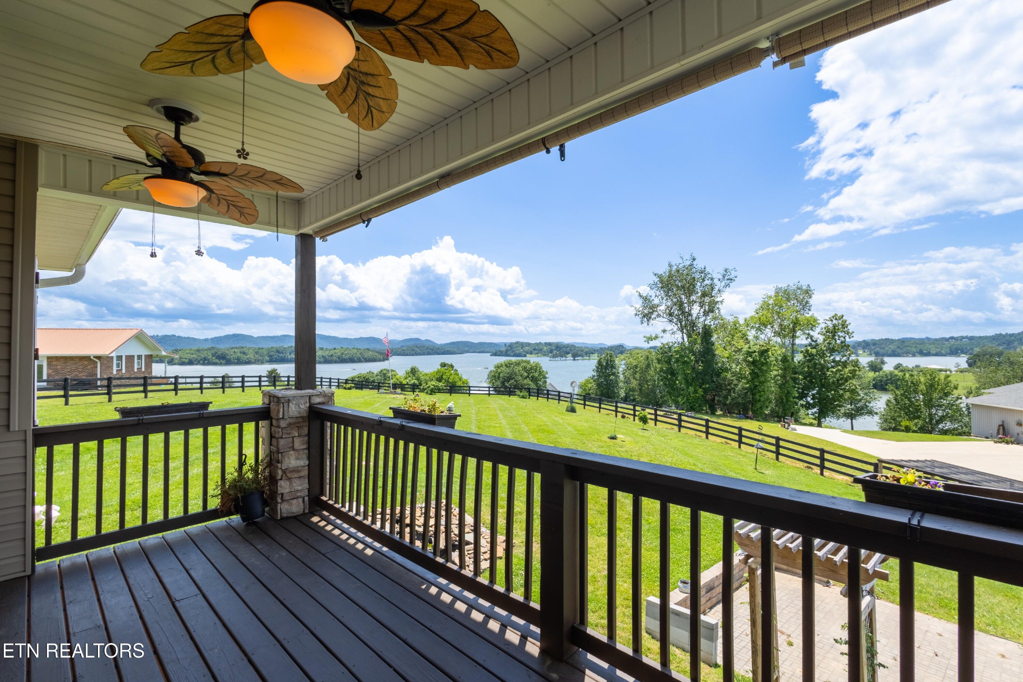143 Sunset Lane Bean Station, TN 37708 - Photo 17 of 26 a view of a porch with wooden floor
