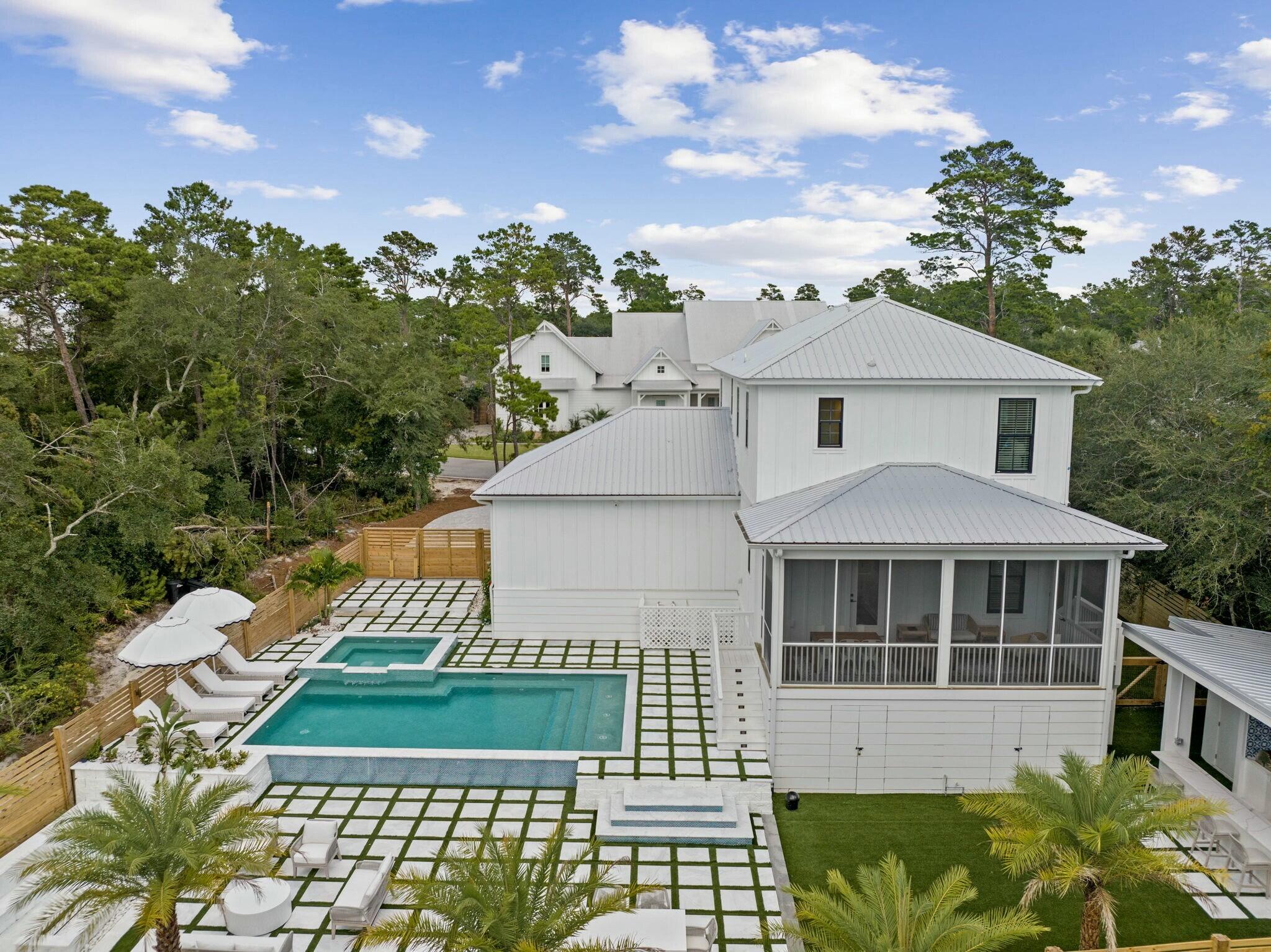 349 Seabreeze Blvd Inlet Beach Inlet Beach, FL 32461 - Photo 21 of 74 a front view of a house with a yard
