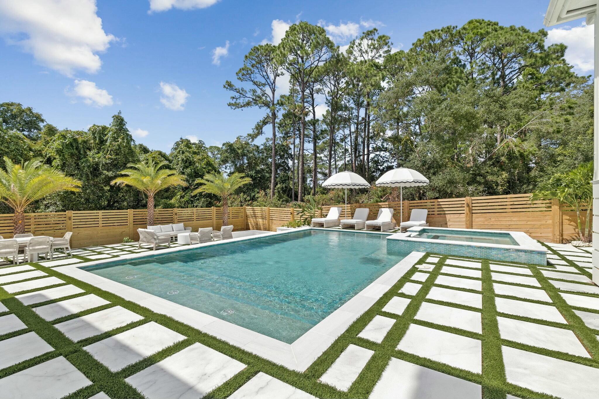 349 Seabreeze Blvd Inlet Beach Inlet Beach, FL 32461 - Photo 24 of 74 a view of a swimming pool with a patio