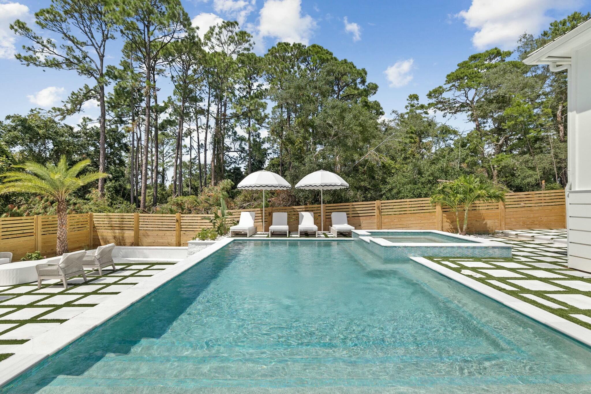 349 Seabreeze Blvd Inlet Beach Inlet Beach, FL 32461 - Photo 25 of 74 a view of a swimming pool and lounge chair