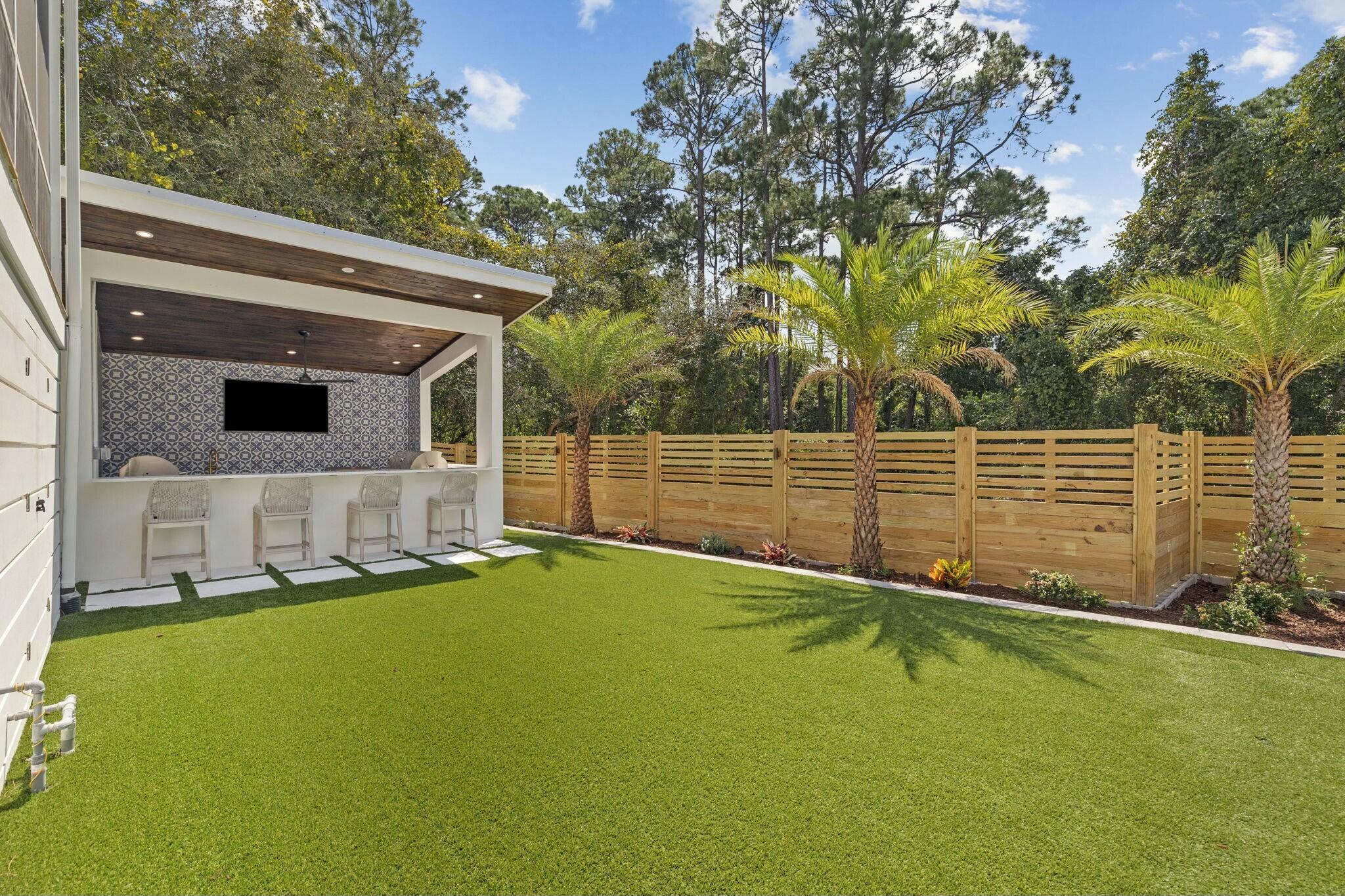 349 Seabreeze Blvd Inlet Beach Inlet Beach, FL 32461 - Photo 27 of 74 a view of a backyard with a small cabin