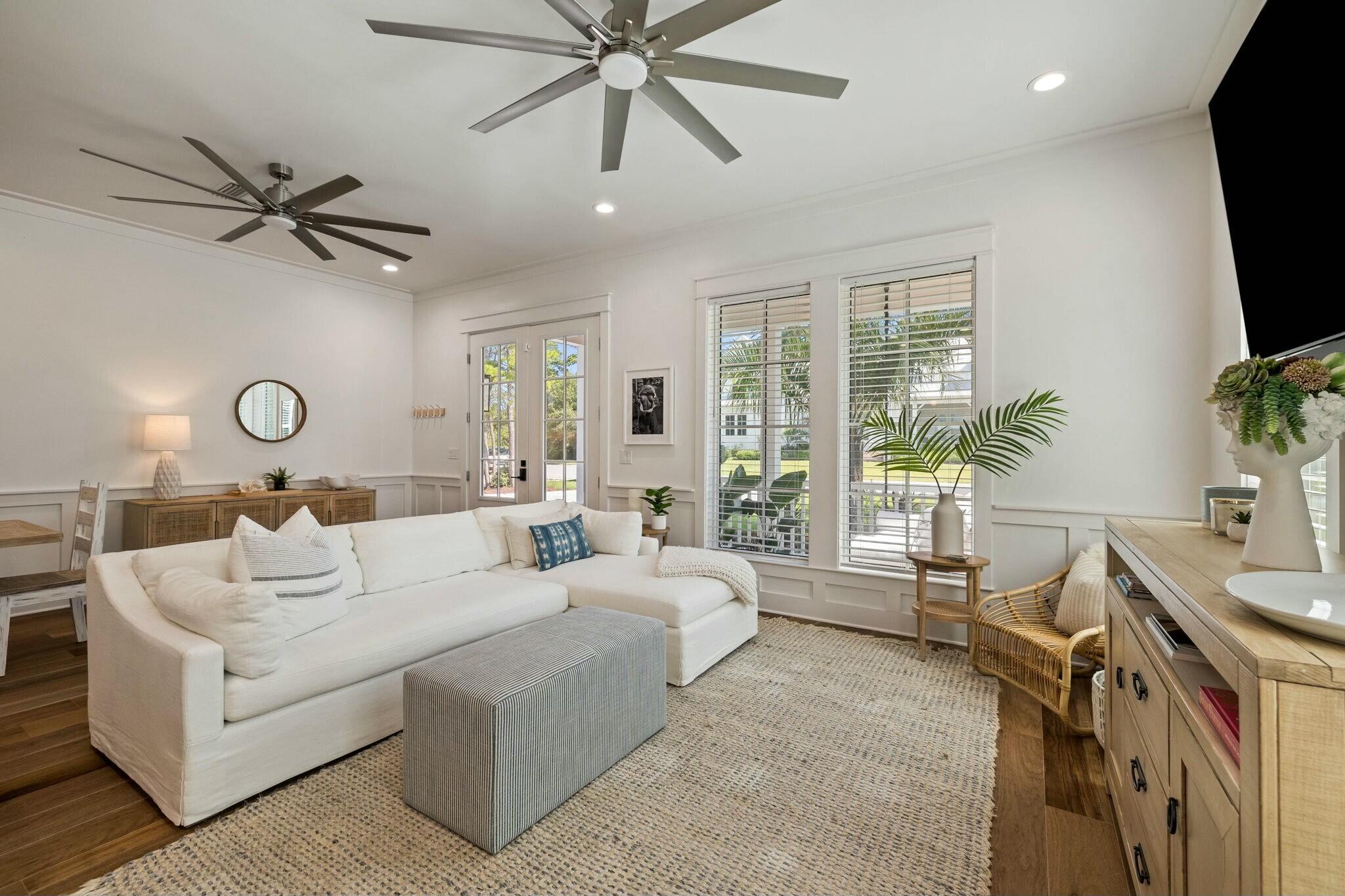 349 Seabreeze Blvd Inlet Beach Inlet Beach, FL 32461 - Photo 41 of 74 a living room with furniture and a flat screen tv