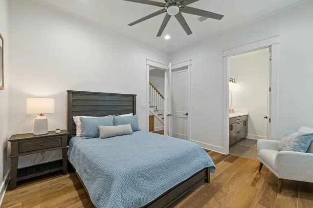 a view of a patio with a table chairs and a balcony