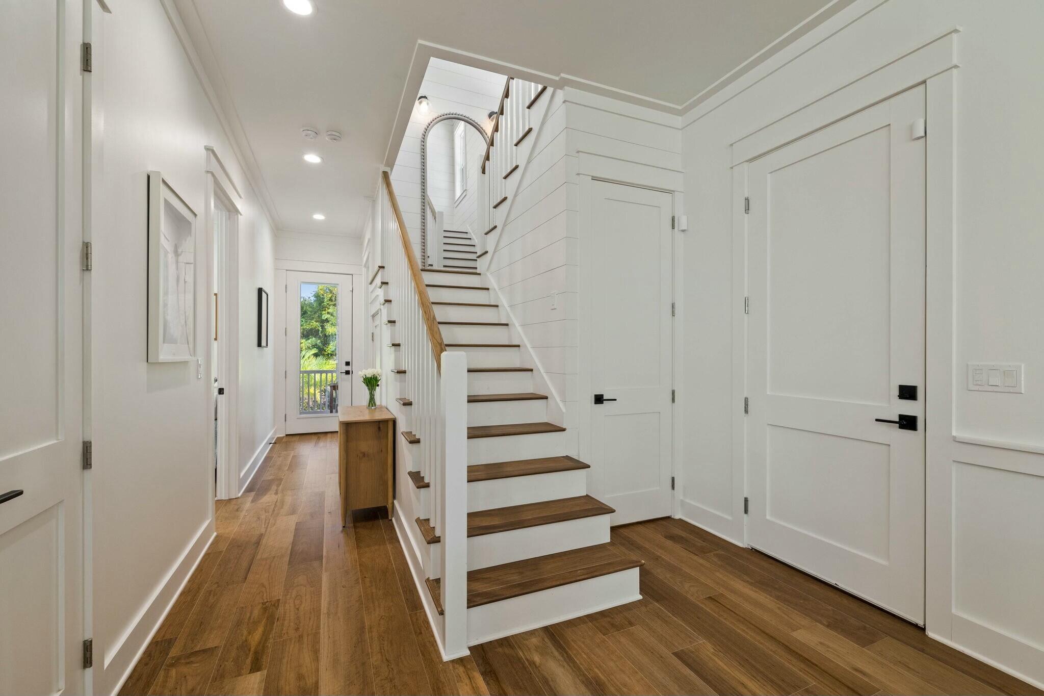 349 Seabreeze Blvd Inlet Beach Inlet Beach, FL 32461 - Photo 53 of 74 a view of a room with wooden floor and stairs
