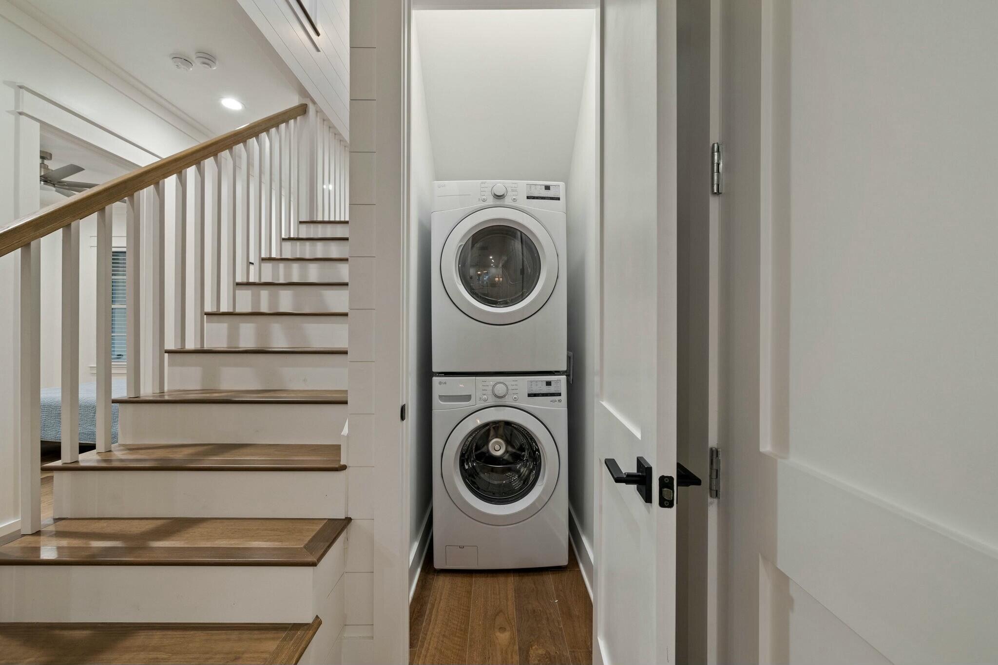 349 Seabreeze Blvd Inlet Beach Inlet Beach, FL 32461 - Photo 54 of 74 a view of walk in closet with wooden floor washer and dryer