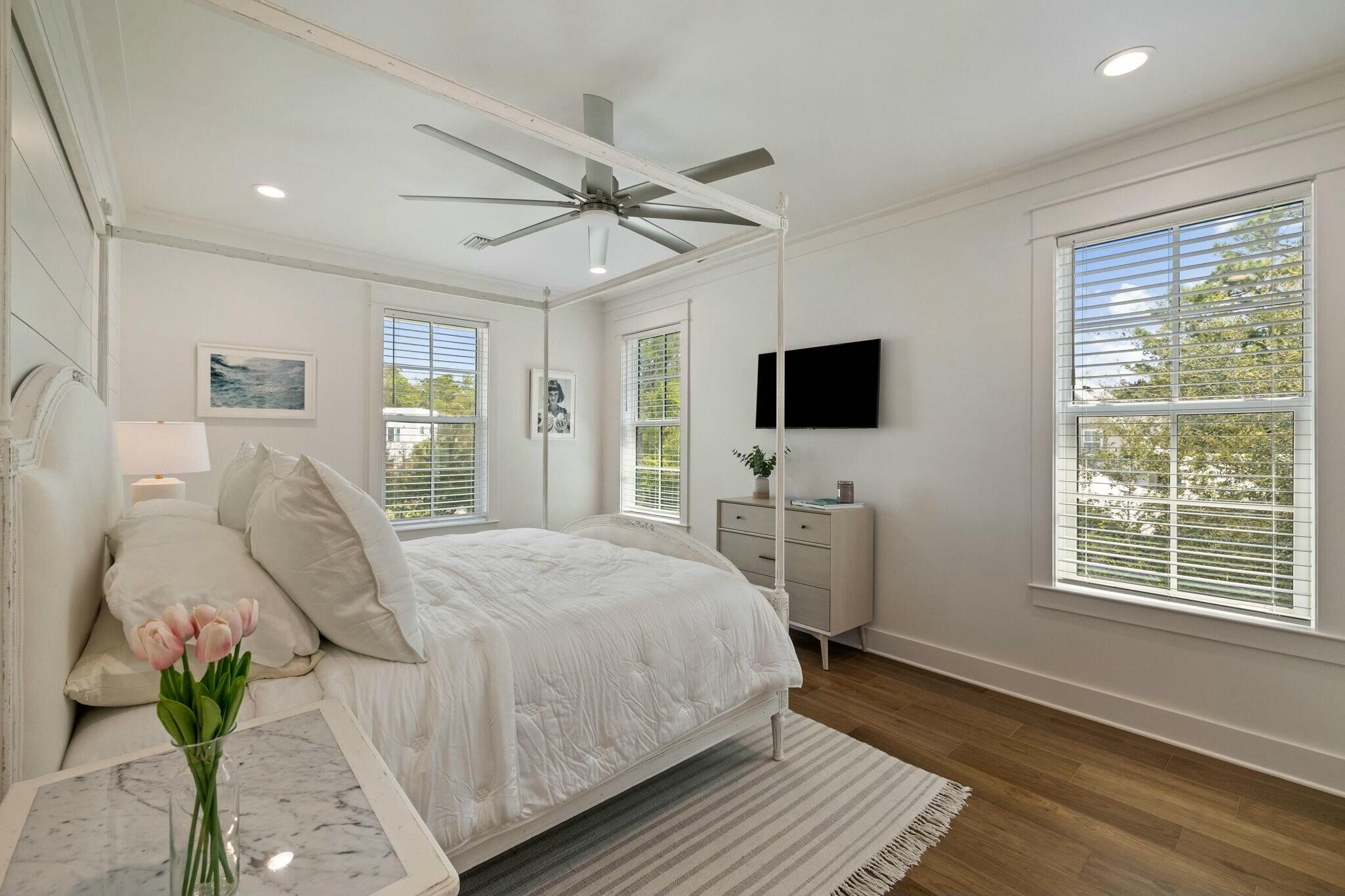 349 Seabreeze Blvd Inlet Beach Inlet Beach, FL 32461 - Photo 65 of 74 a bedroom with a bed tv and a window