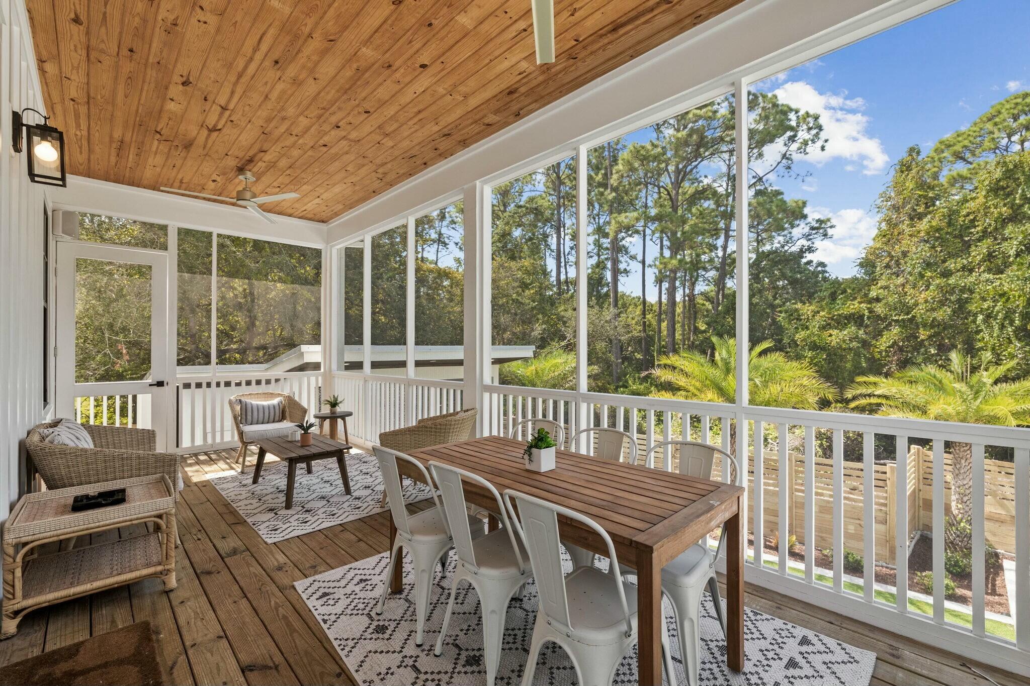 349 Seabreeze Blvd Inlet Beach Inlet Beach, FL 32461 - Photo 70 of 74 a view of a patio with a table chairs and a balcony