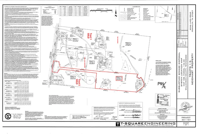 a black and white photo of a living room