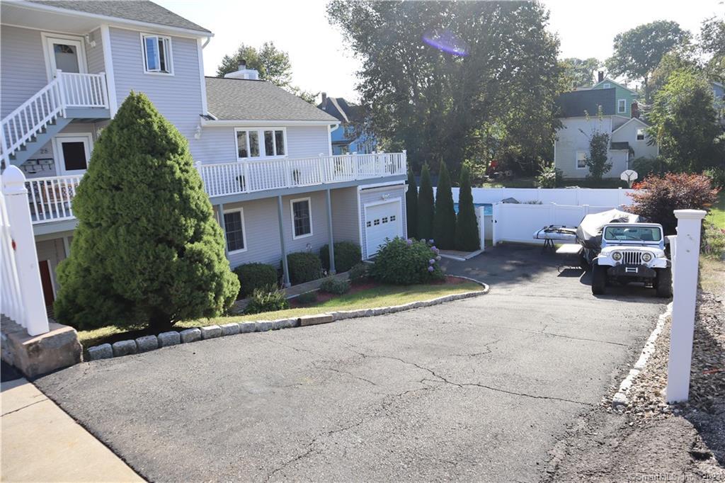 28 Smith Street Derby, CT 06418 - Photo 1 of 1 a view of a street with cars
