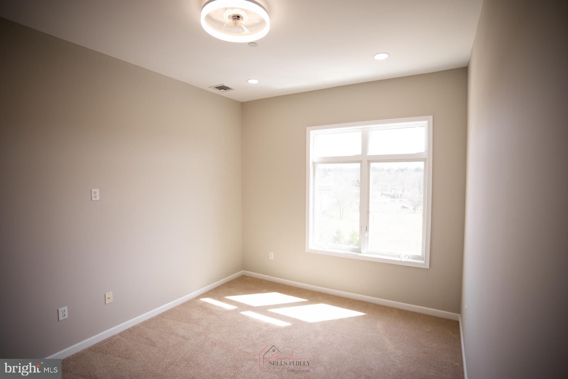 528 Carson Terrace Huntingdon Valley, PA 19006 - Photo 27 of 43 an empty room with a window