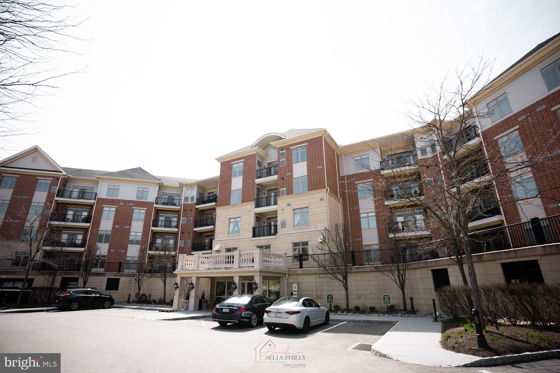 528 Carson Terrace Huntingdon Valley, PA 19006 - Photo 34 of 43 a street view with tall buildings