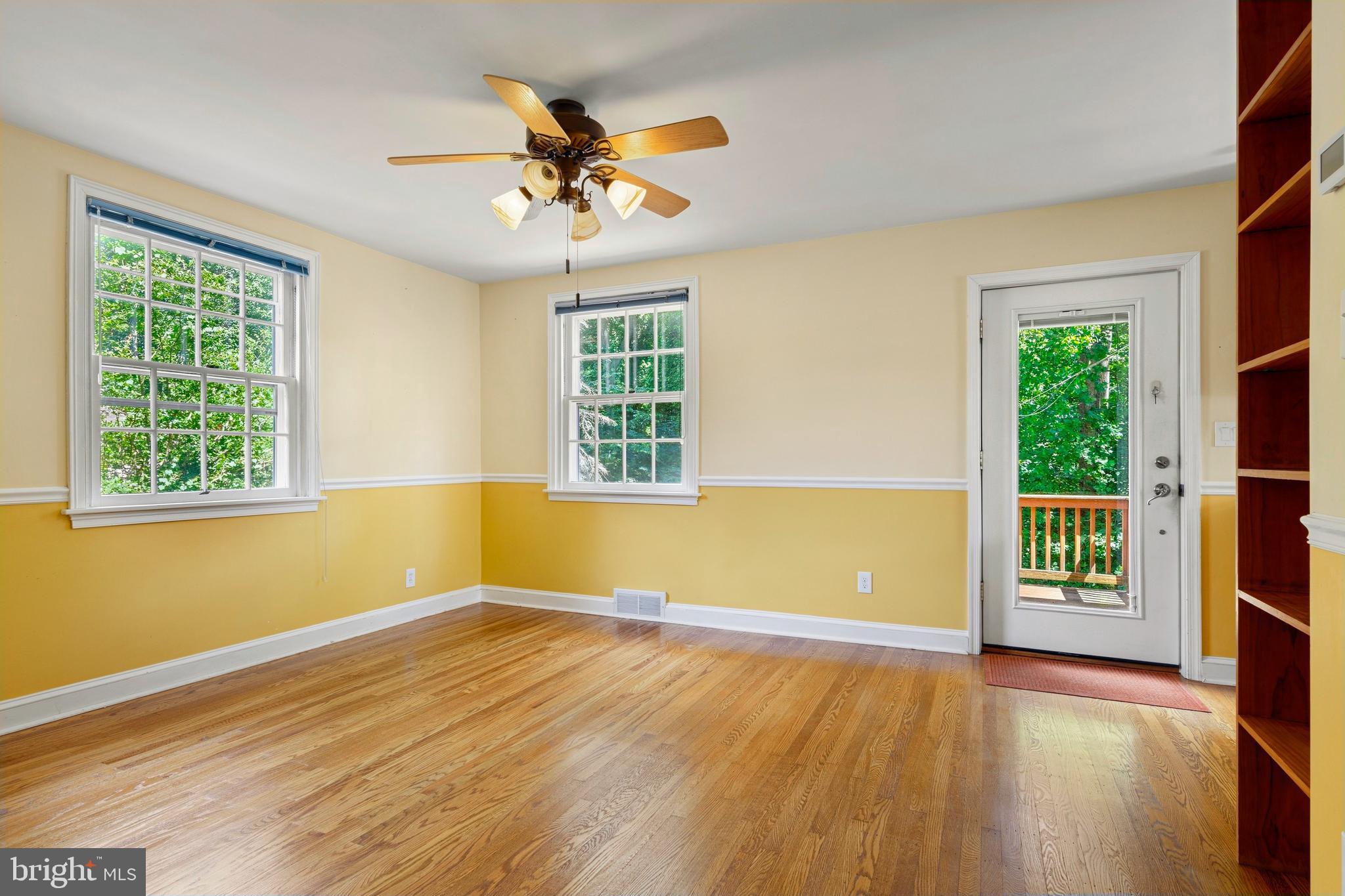 5020 Dermond Road Drexel Hill, PA 19026 - Photo 10 of 39 a view of an empty room with wooden floor and a window